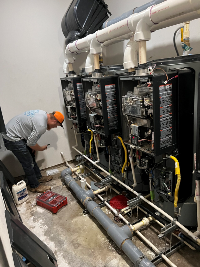 Commercial Plumbing Magnolia TX professional inspecting commercial water pipes