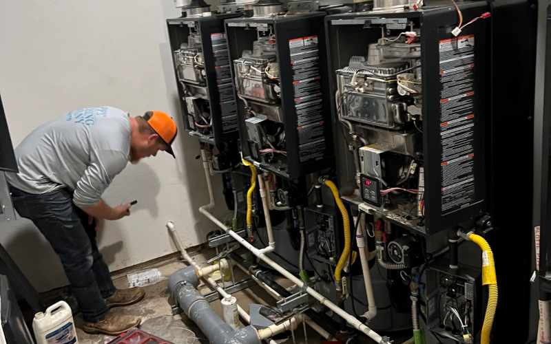 Commercial Plumbing Magnolia TX professional inspecting commercial water pipes